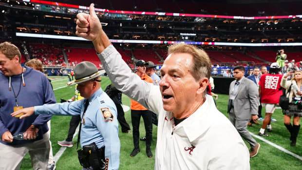 Alabama coach Nick Saban gives a thumbs-up after the Crimson Tide defeat Georgia at the 2023 SEC championship.